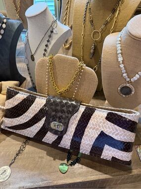 Adrienne Vittidinni straw clutch in brown and cream